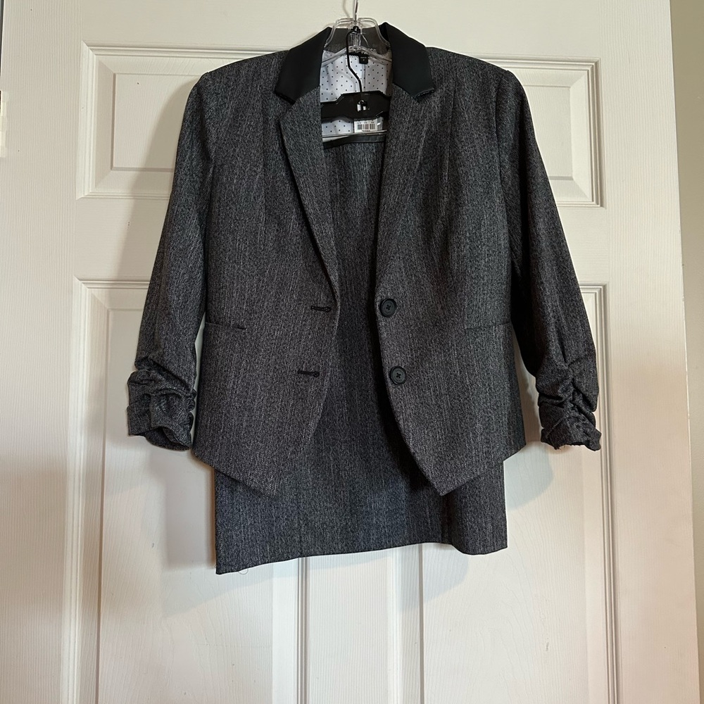 Matching dark grey suit (jacket size 2 and skirt size 0), NWT